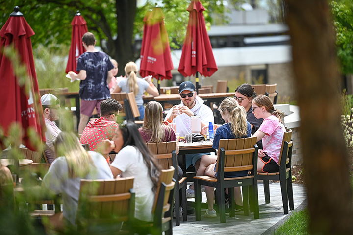 Students share a meal on the Terrace at Tepas Commons.