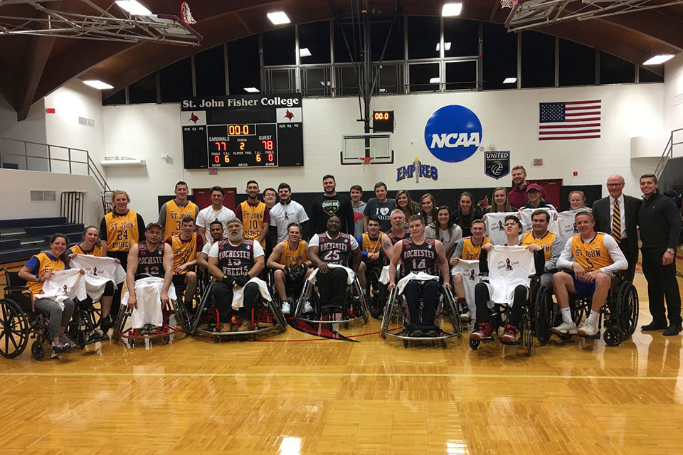 Students, faculty, and staff at St. John Fisher College raised more than $1,000 during the annual Wheels ‘N Steals basketball game.