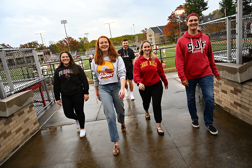 Students walk through Growney Stadium.