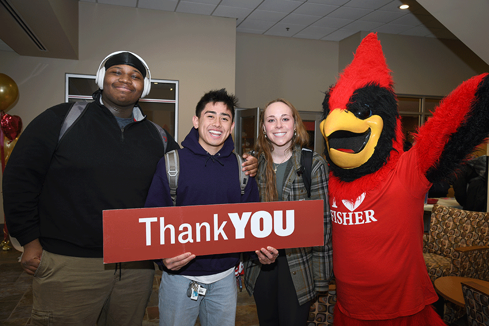 Students celebrate I Heart Fisher Day with Cardinal.
