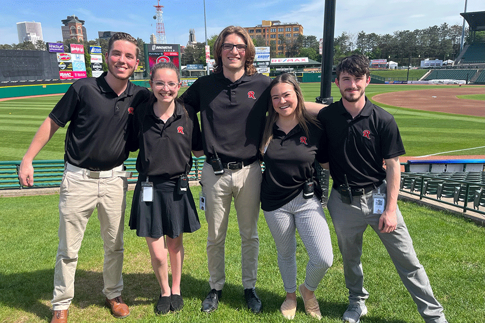 A group of Fisher students during their internship with the Rochester Redwings.